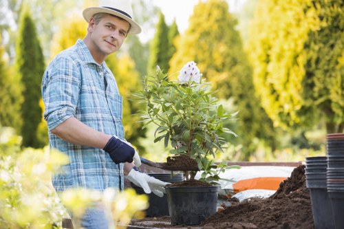 Gardeners working on a lush Chiswick garden